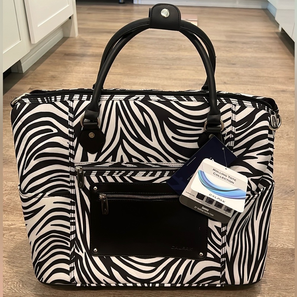 NWT Calpak Zanny Zebra Travel Bag Tote Rolling Laptop Sleeve Carry On 21”